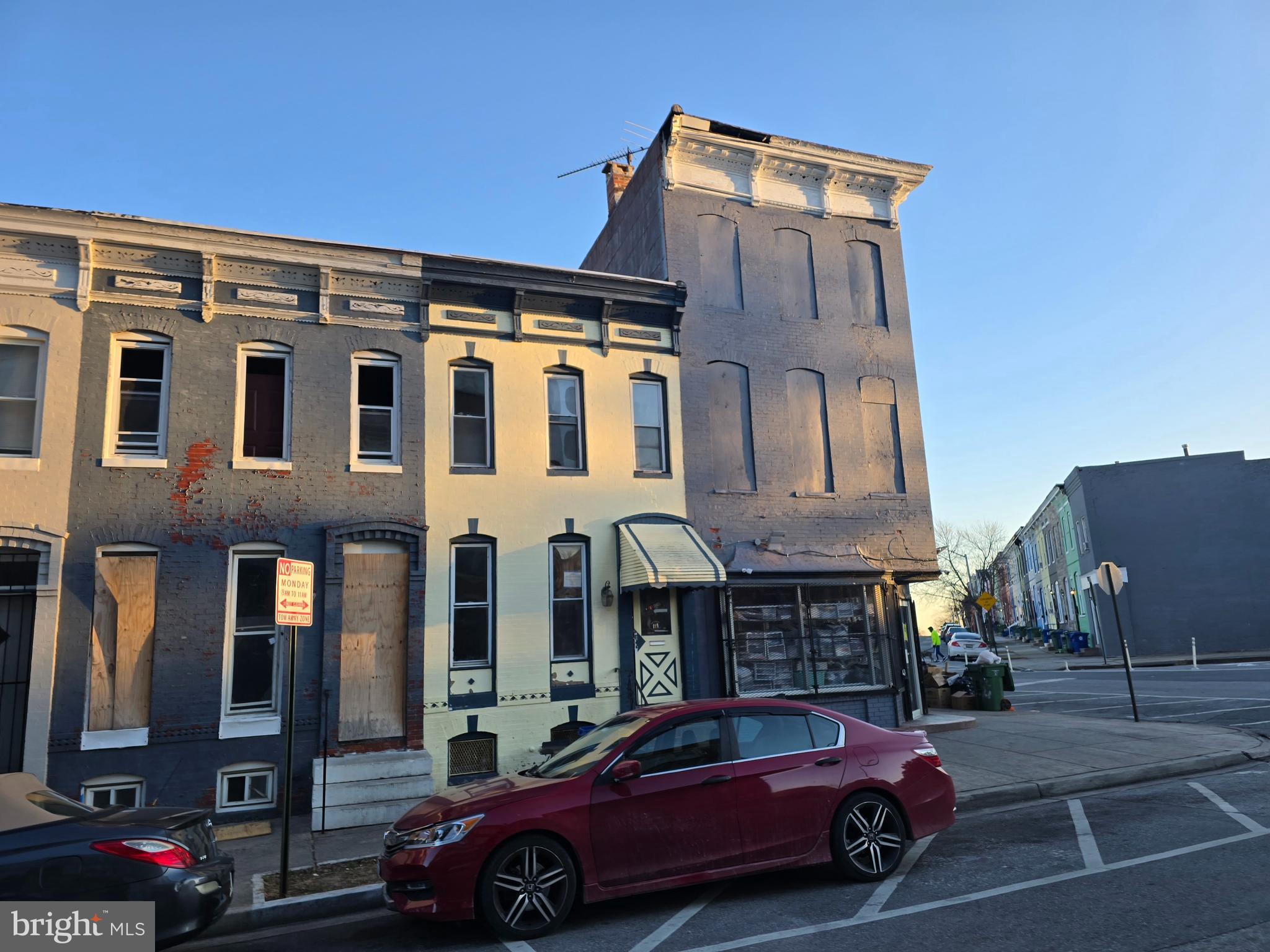 727 Baker Street Baltimore, MD 21217 - Photo 2 of 2 a car parked in front of a building