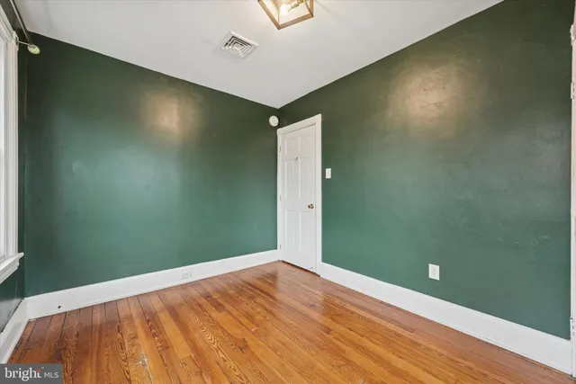 a view of a big room with wooden floor