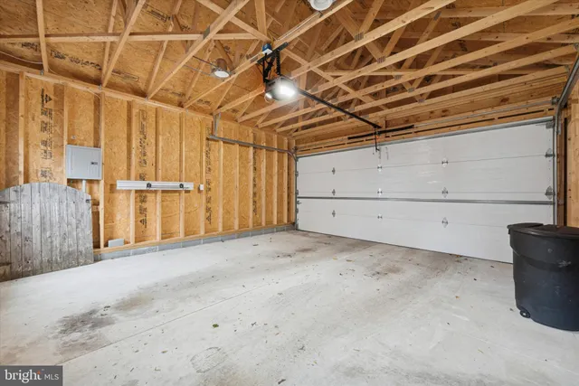 a view of a room with wooden walls