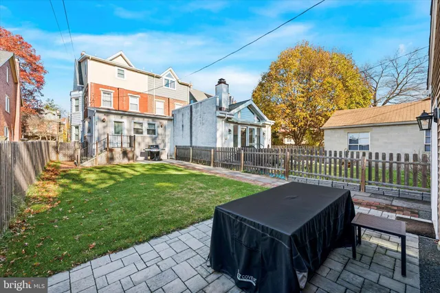 a terrace of a house with garden and deck