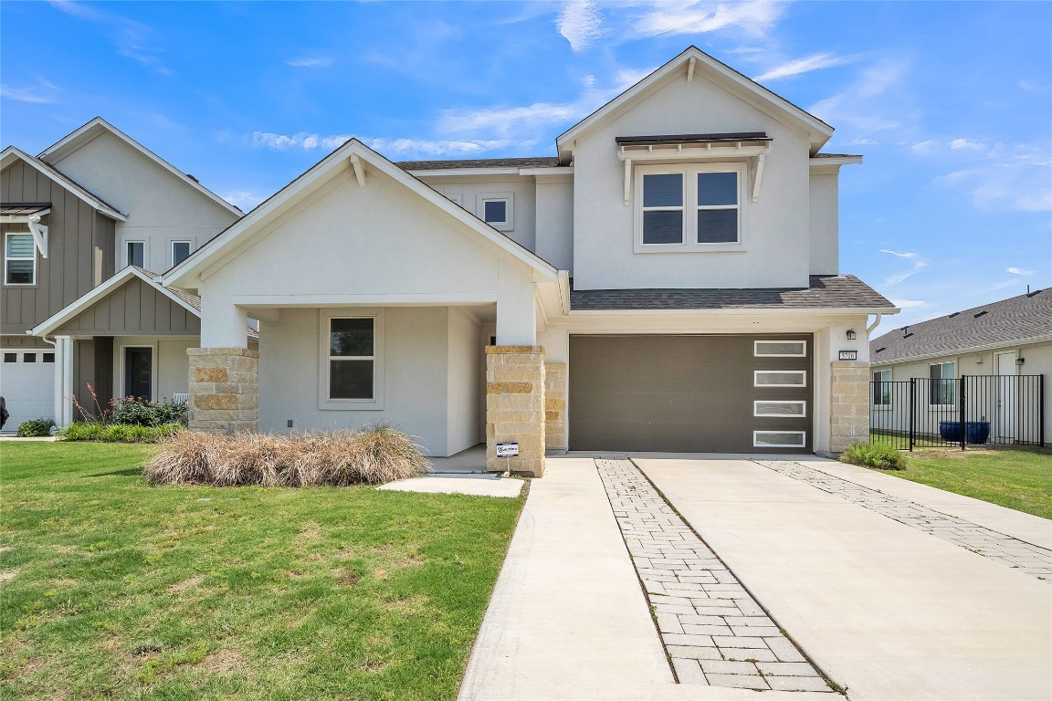 a front view of house with yard