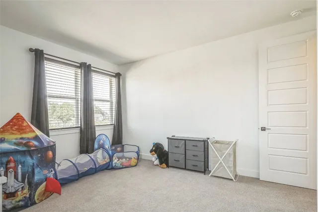 a en suite bathroom with a sink a mirror and a shower