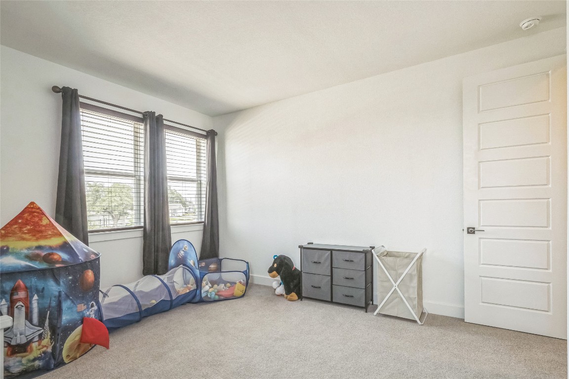 3706 Mesquite Vly Road Georgetown, TX 78628 - Photo 19 of 30 a living room with furniture and a window