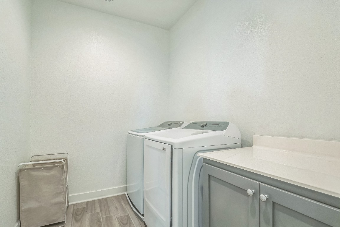 3706 Mesquite Vly Road Georgetown, TX 78628 - Photo 25 of 30 a utility room with dryer and washer