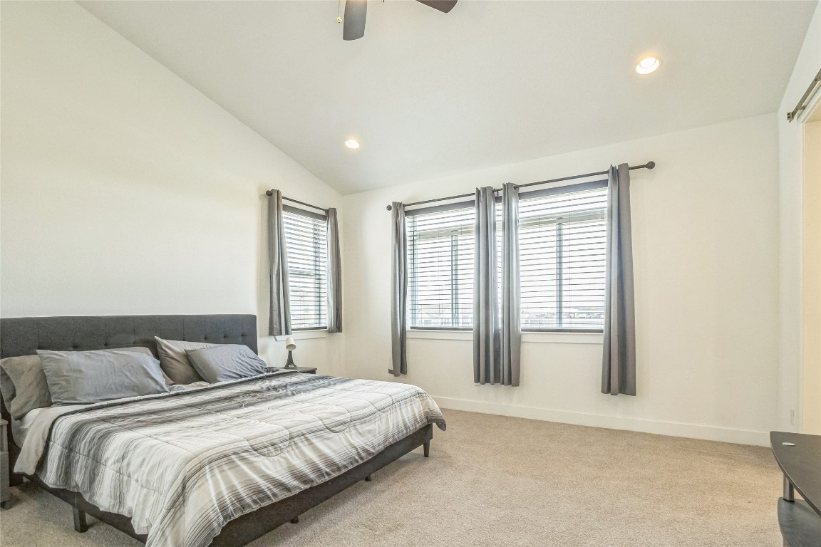 3706 Mesquite Vly Road Georgetown, TX 78628 - Photo 10 of 30 a bedroom with a bed and a window