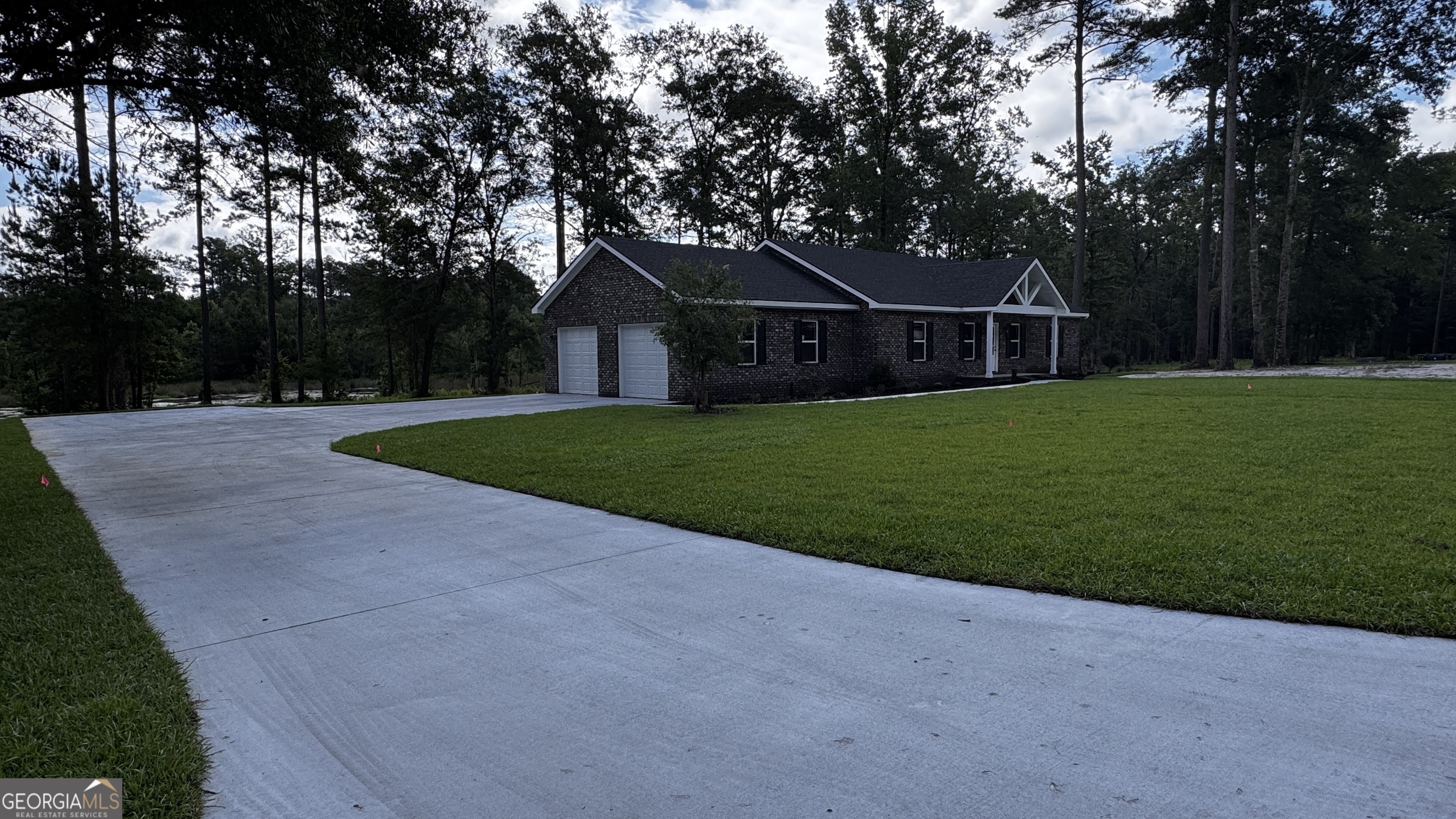 3 Willow Pointe Claxton, GA 30417 - Photo 2 of 31 a front view of house with yard and green space