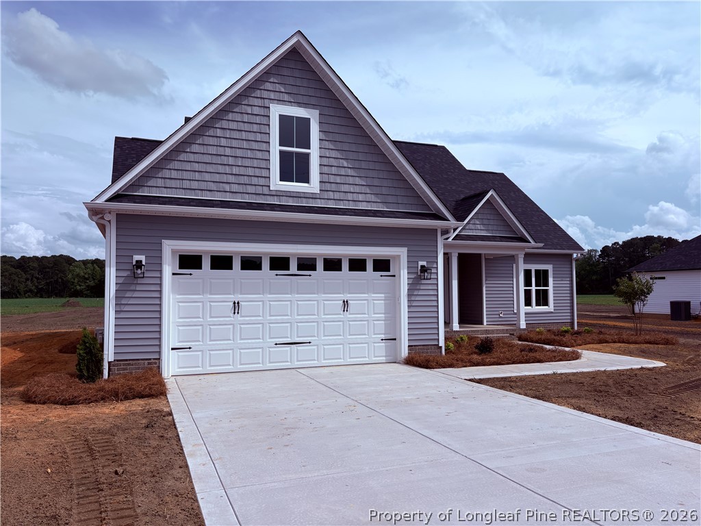 1075 Purdie-Hall Road Tar Heel, NC 28392 - Photo 26 of 28 a view of a house with a yard