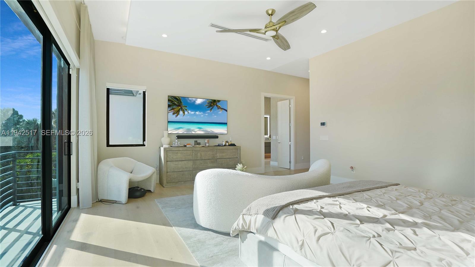 510 Northeast 4th Lane Boca Raton, FL 33432 - Photo 27 of 67 a bedroom with a bed and a couch