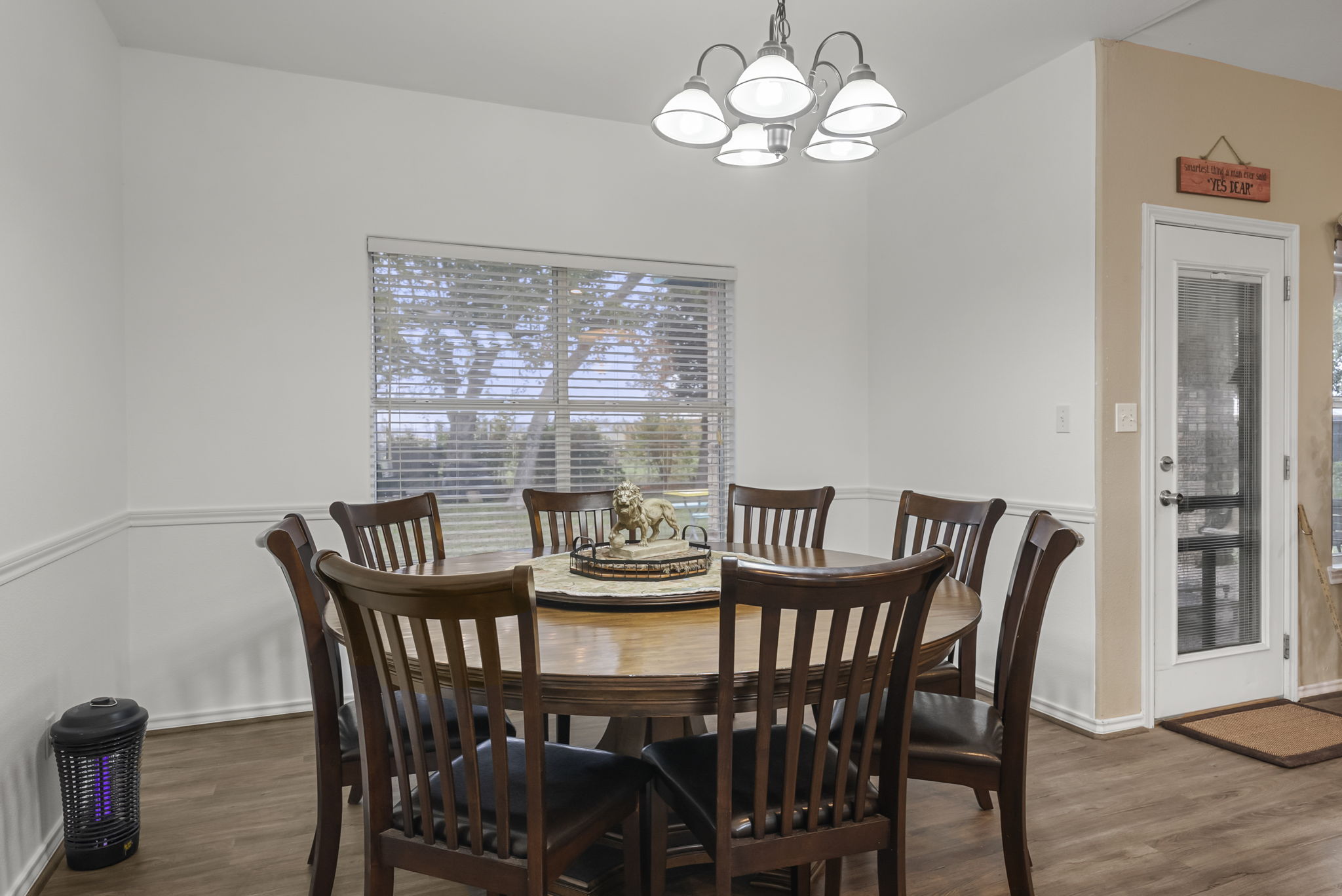 107 Frederick Lane Thorndale, TX 76577 - Photo 5 of 11 a view of a dining room with furniture window and wooden floor