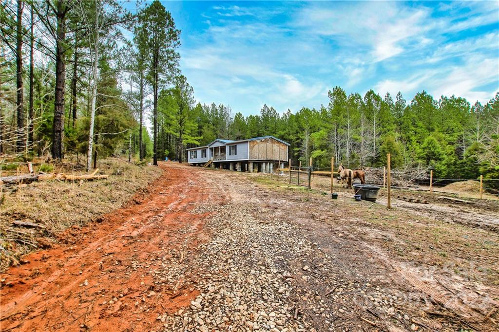 245 Dickson Road Blacksburg, SC 29702 - Photo 3 of 13 a view of a house with backyard and sitting area
