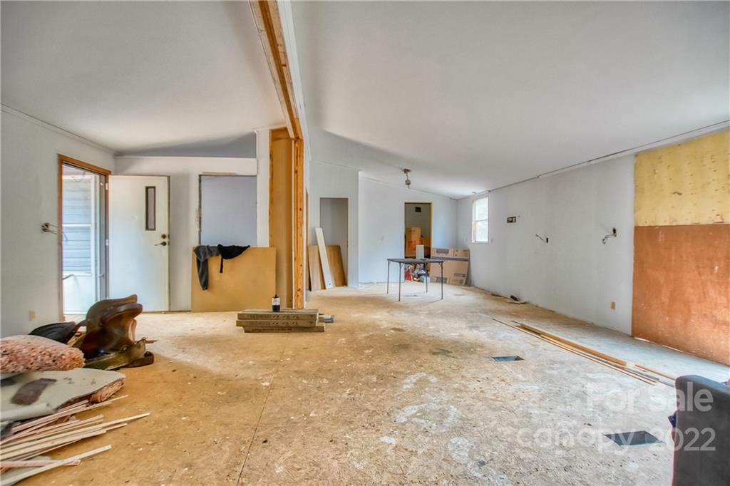 245 Dickson Road Blacksburg, SC 29702 - Photo 6 of 13 a view of a bedroom with a large bed and large windows