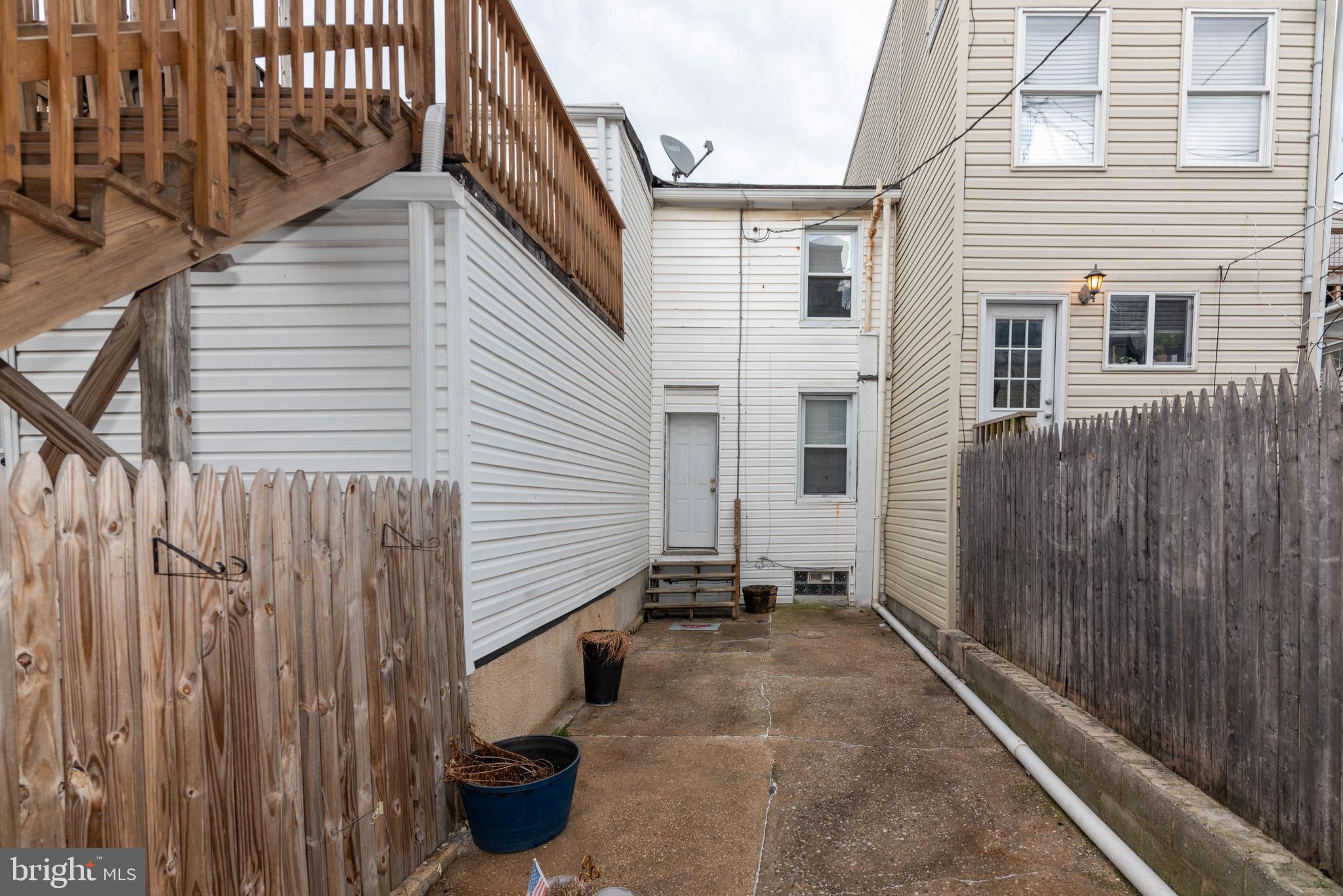 1622 Patapsco Street Baltimore, MD 21230 - Photo 29 of 30 a view of a backyard with side of the house