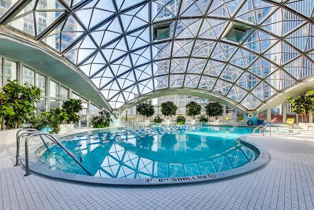400 East Randolph Street, Unit 930 Chicago, IL 60601 - Photo 16 of 34 a view of a swimming pool with a yard