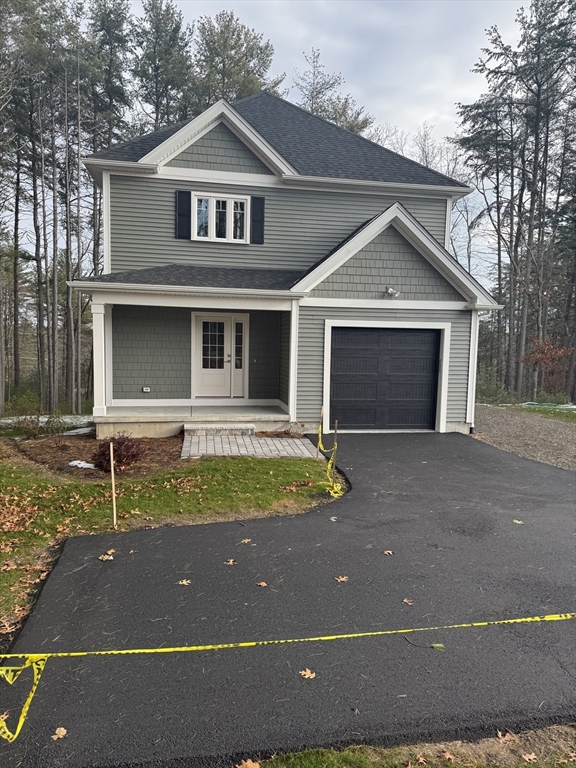 27 James Road, Unit 1 Upton, MA 01568 - Photo 2 of 41 front view of house with a yard