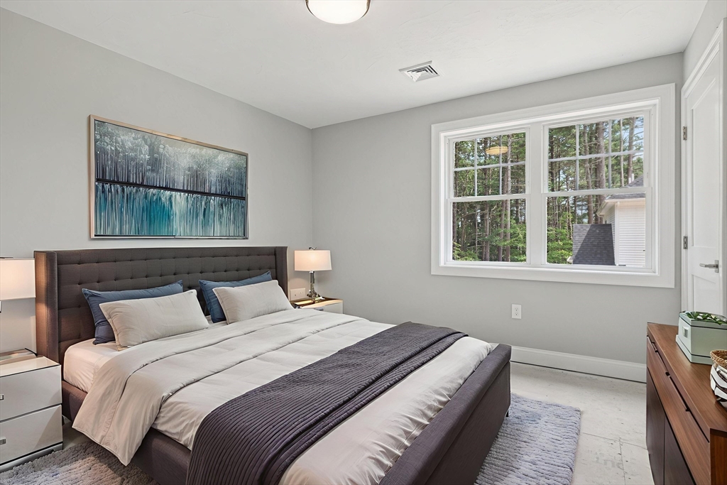 27 James Road, Unit 1 Upton, MA 01568 - Photo 23 of 41 a bedroom with a bed and a window