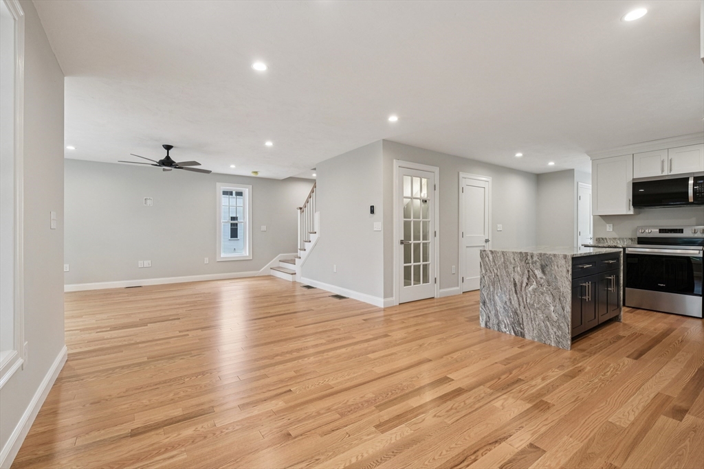 27 James Road, Unit 1 Upton, MA 01568 - Photo 10 of 41 a view of kitchen with cabinets and wooden floor