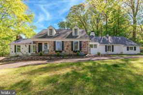 795 Mancill Road Wayne, PA 19087 - Photo 1 of 1 a front view of a house with swimming pool