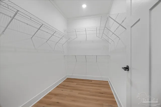 a view of a room with racks on the wall