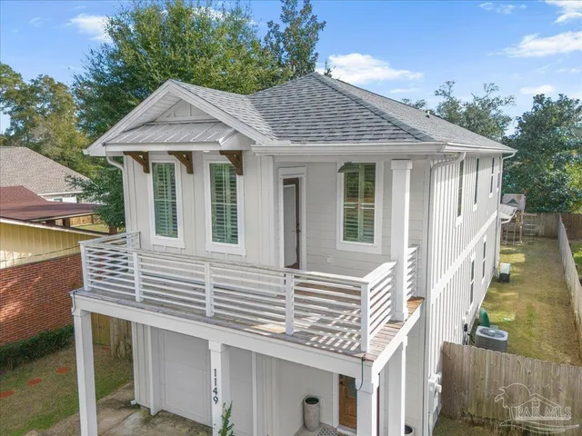 a aerial view of a house with a porch