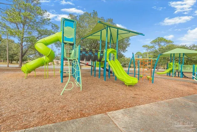 a view of a park with a slide
