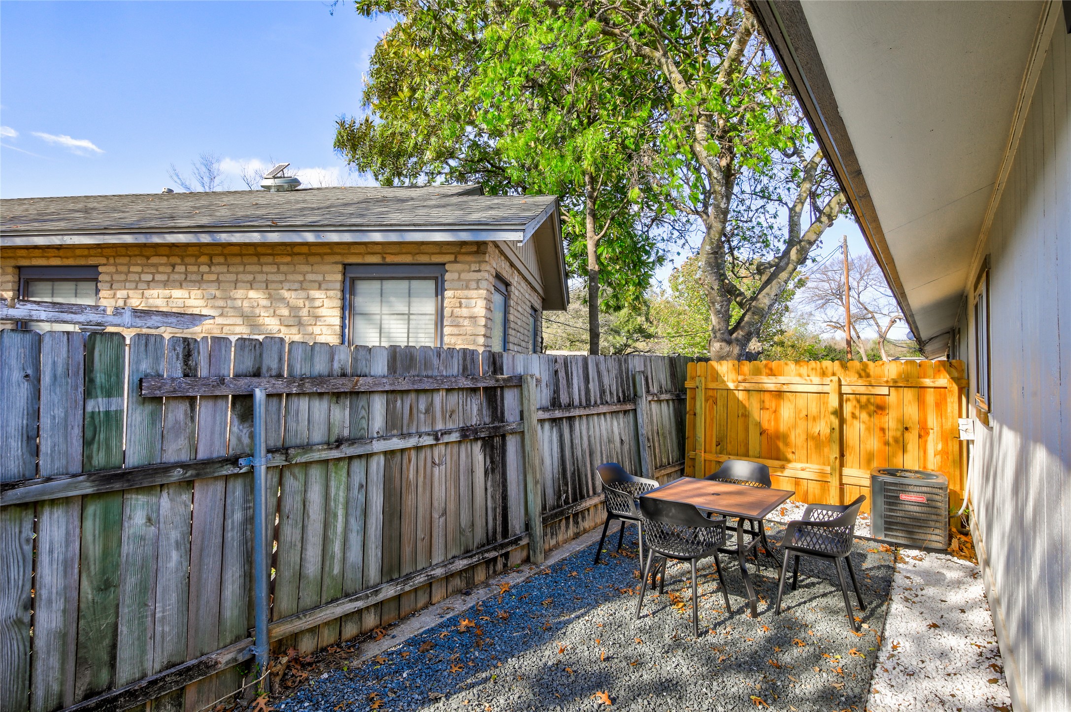 10509 Macmora Road, Unit B Austin, TX 78758 - Photo 15 of 19 a view of a chair and table on the roof deck