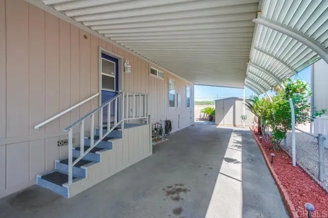 a view of a porch with furniture