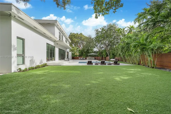a garden view with a seating space