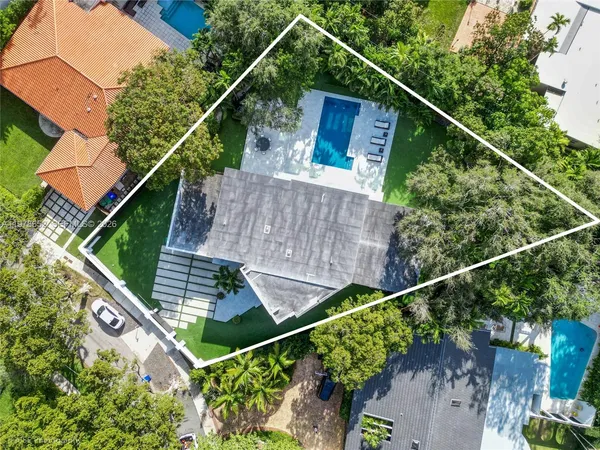 a balcony with lots of trees in the background