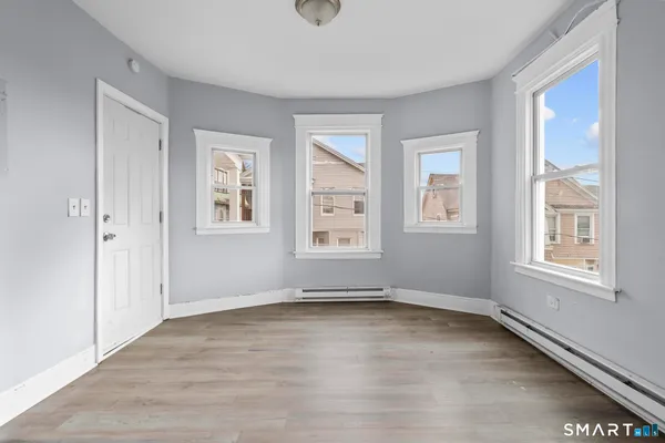 an empty room with windows
