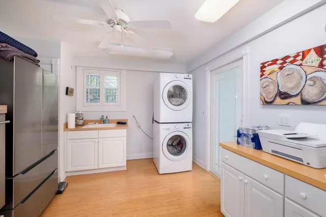 a view of swimming pool with outdoor seating and plants
