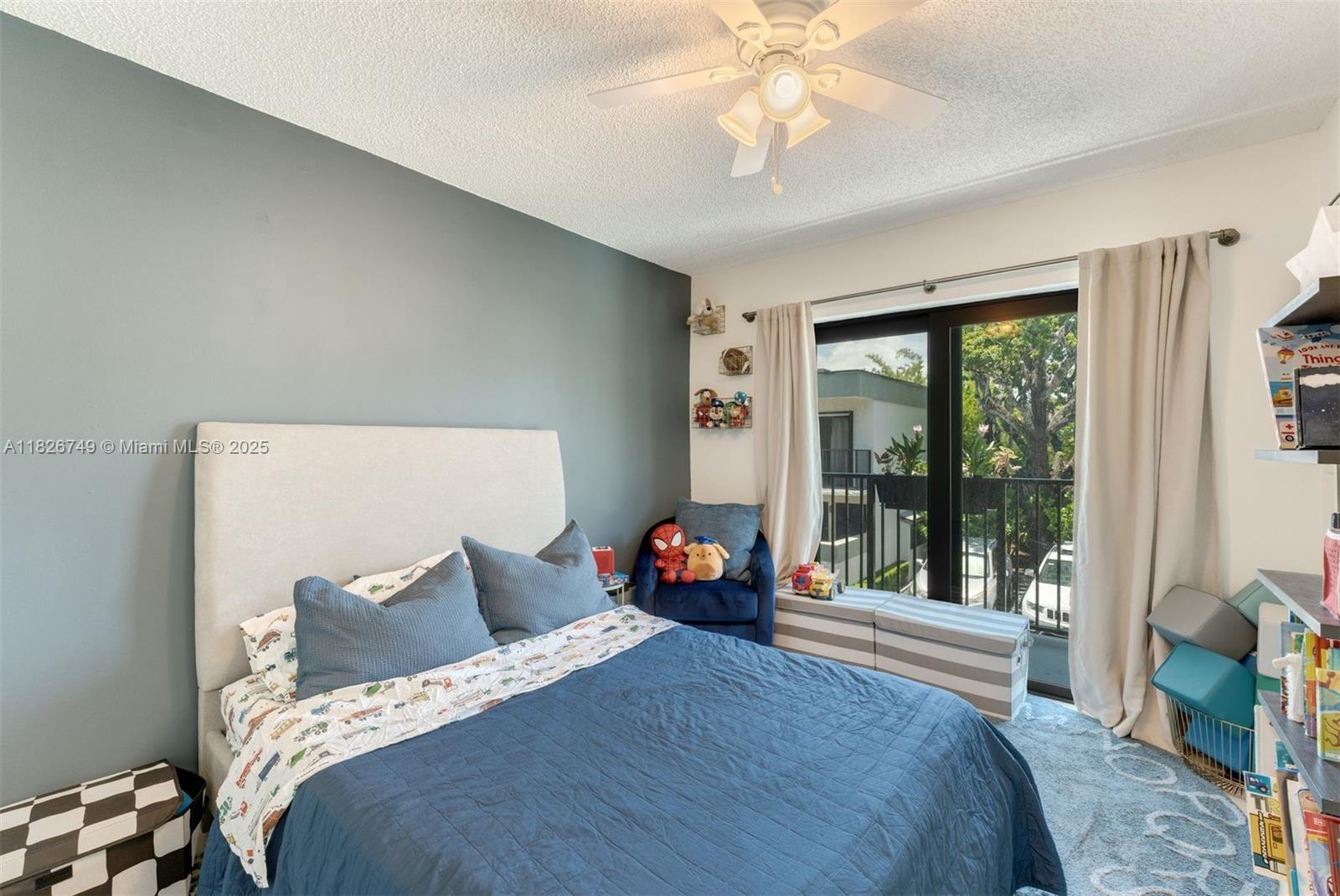 3214 West Trade Avenue, Unit III5 Miami, FL 33133 - Photo 20 of 31 a bedroom with a bed and a chandelier