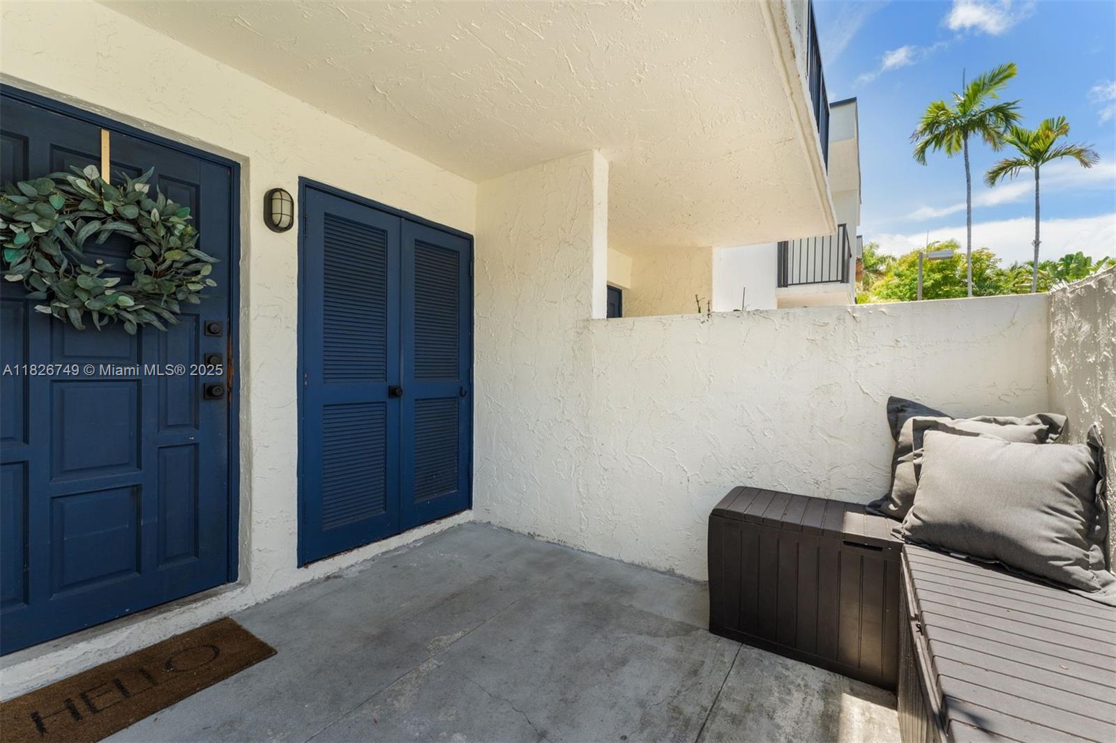 3214 West Trade Avenue, Unit III5 Miami, FL 33133 - Photo 28 of 31 a living room with furniture and a potted plant