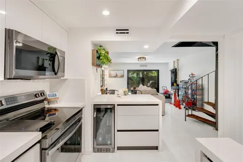 a view of kitchen center island and living room