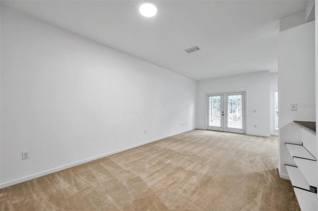 8206 Bally Money Road Tampa, FL 33610 - Photo 11 of 43 a view of an empty room with a window