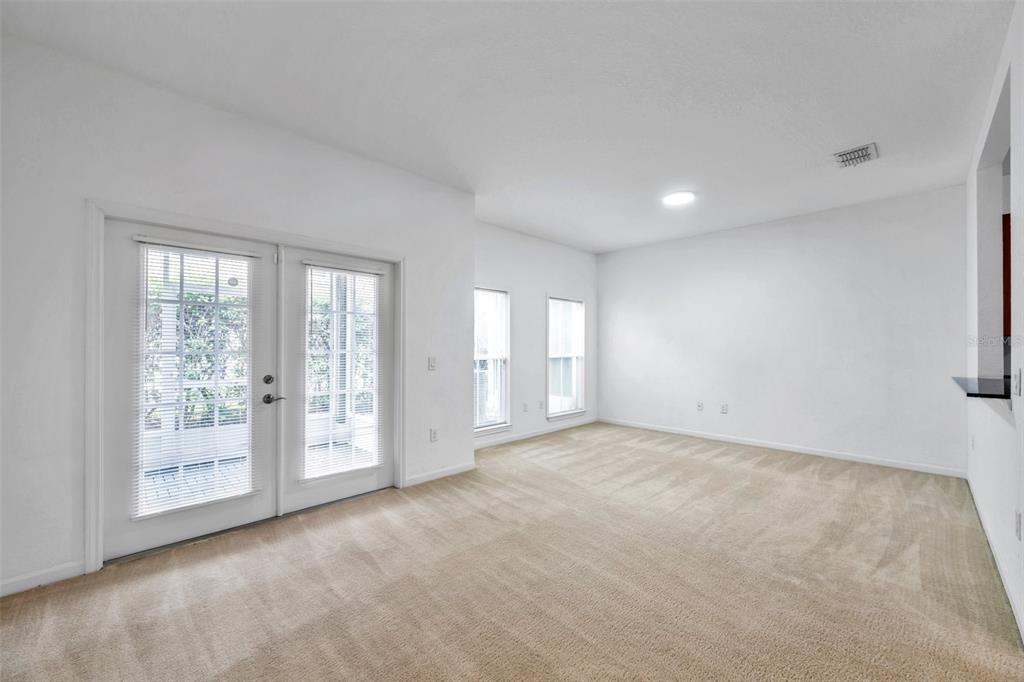 8206 Bally Money Road Tampa, FL 33610 - Photo 12 of 43 an empty room with windows