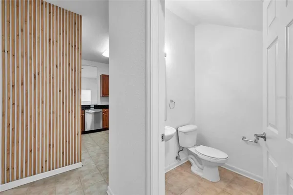 a bathroom with a toilet and a sink