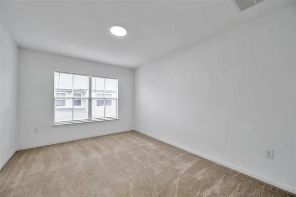 an empty room with a window