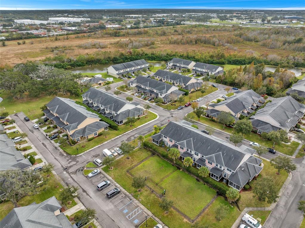 8206 Bally Money Road Tampa, FL 33610 - Photo 41 of 43 an aerial view of residential houses with outdoor space
