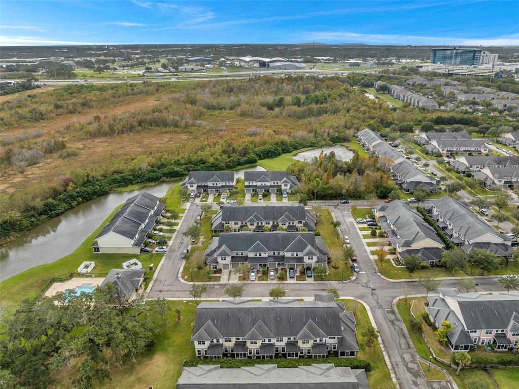 8206 Bally Money Road Tampa, FL 33610 - Photo 42 of 43 an aerial view of residential houses with outdoor space