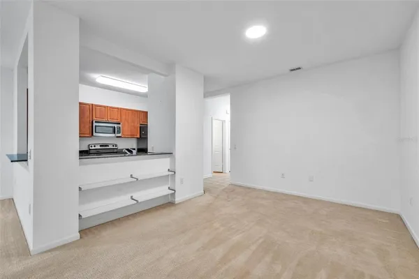 a view of room with flat screen tv