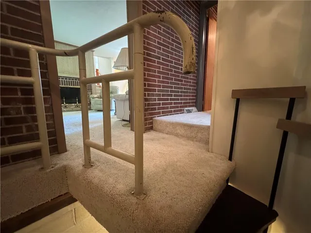 a bathroom with a shower curtain and a toilet