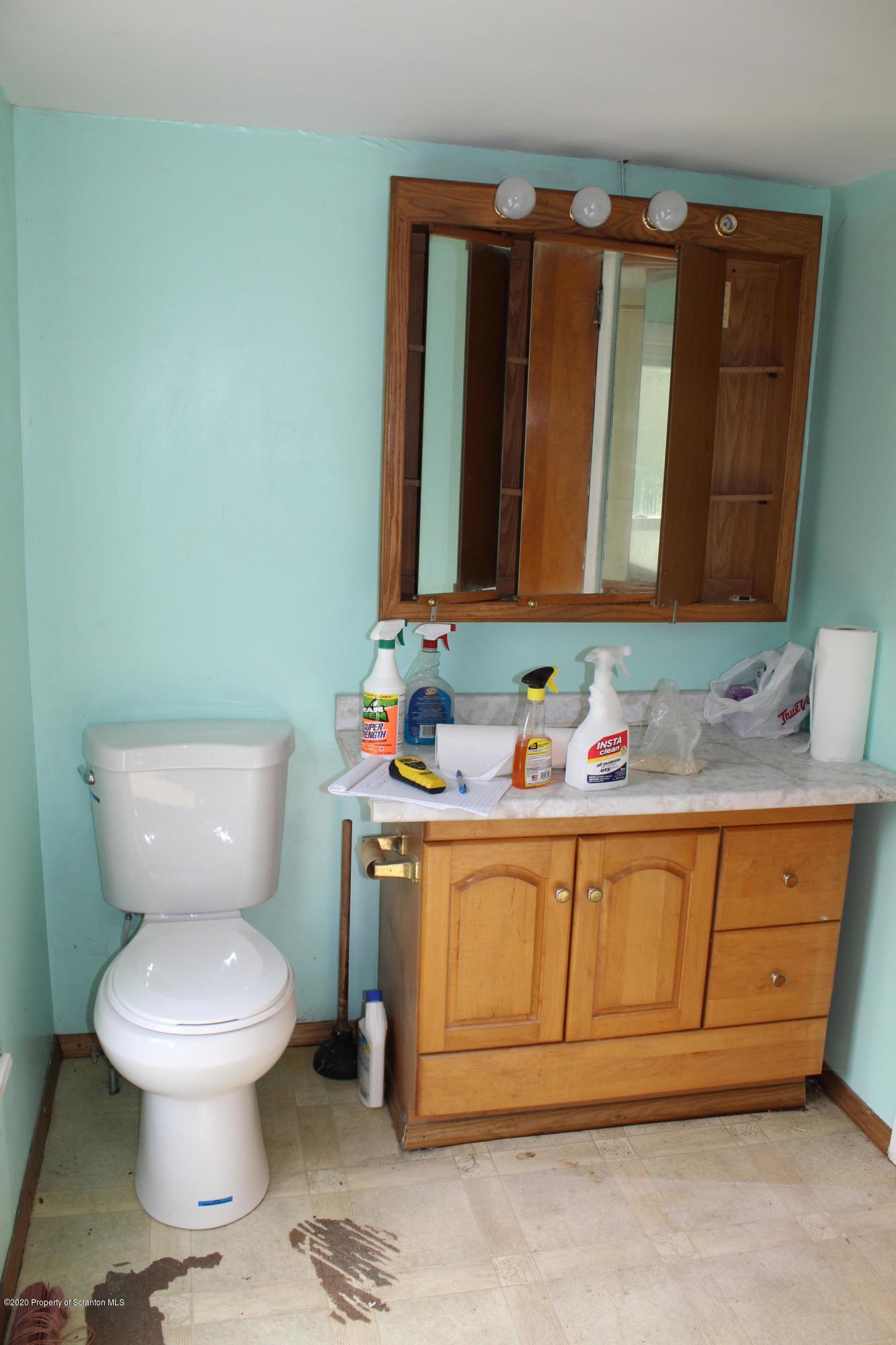 87 Academy Street Springville, PA 18844 - Photo 20 of 23 a bathroom with a toilet sink and mirror