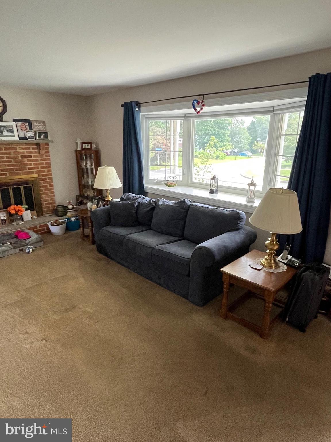 129 Ronald Road Aston, PA 19014 - Photo 32 of 48 a living room with furniture and a window