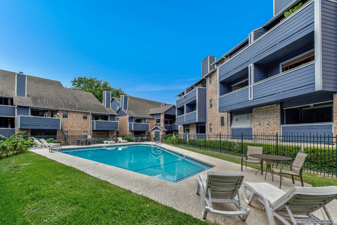 2500 Burleson Road, Unit 621 Austin, TX 78741 - Photo 25 of 26 a view of a house with swimming pool and sitting area