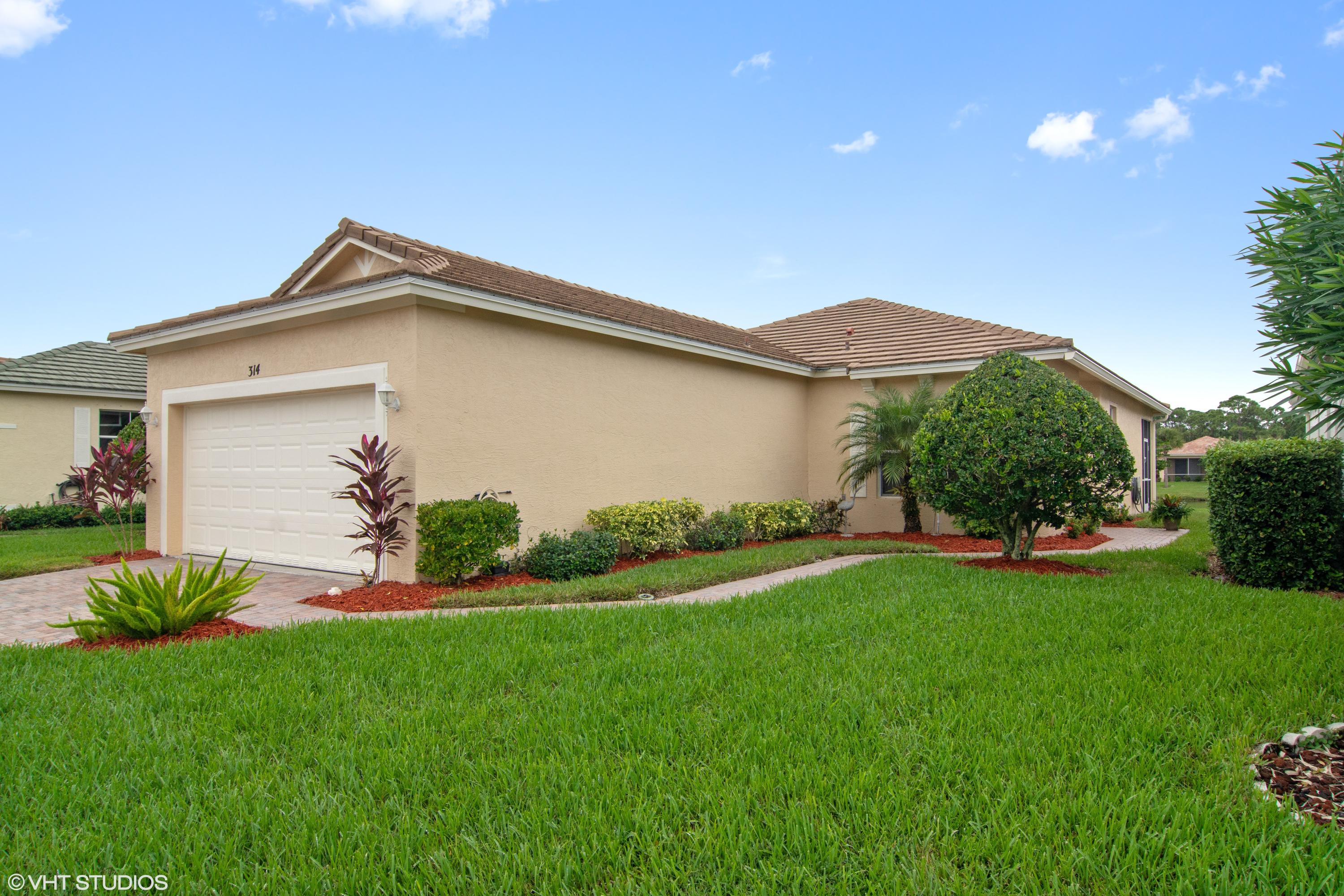 314 Southwest Coconut Key Way Port St. Lucie, FL 34986 - Photo 2 of 28 25_314CoconutKey_571_FrontView_HiRes