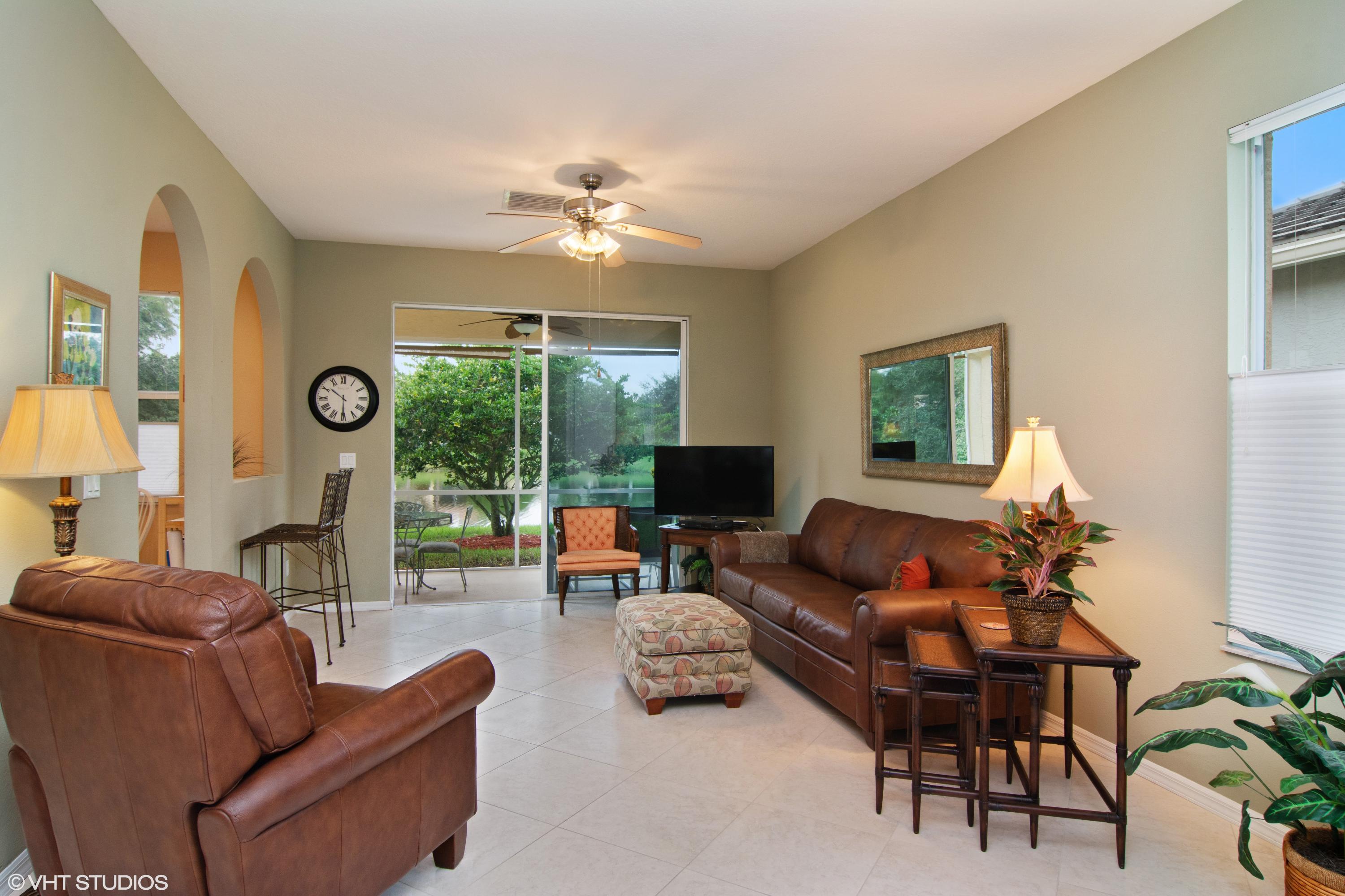 314 Southwest Coconut Key Way Port St. Lucie, FL 34986 - Photo 4 of 28 03_314CoconutKey_1_LivingRoom_HiRes