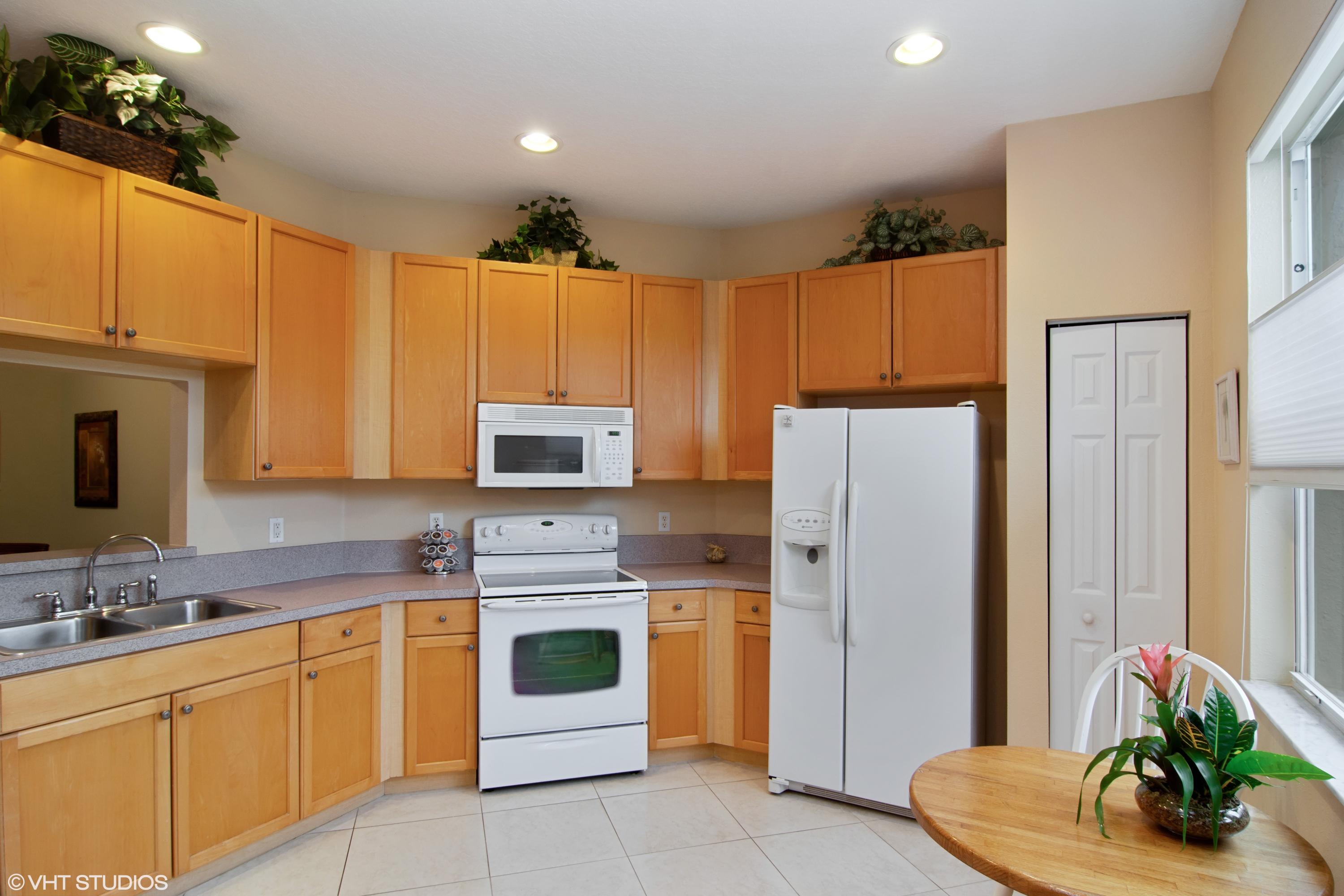 314 Southwest Coconut Key Way Port St. Lucie, FL 34986 - Photo 10 of 28 09_314CoconutKey_177_Kitchen_HiRes