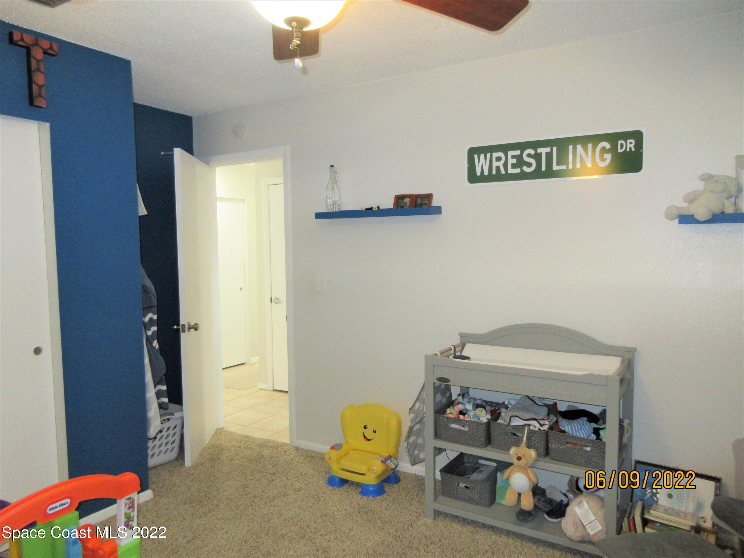 2547 Locksley Road Melbourne, FL 32935 - Photo 20 of 28 a view of kids room with toys