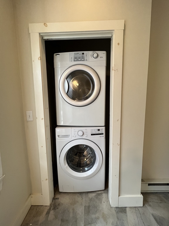 76 Chestnut Street, Unit 2 Newton, MA 02465 - Photo 13 of 21 a utility room with dryer and washer