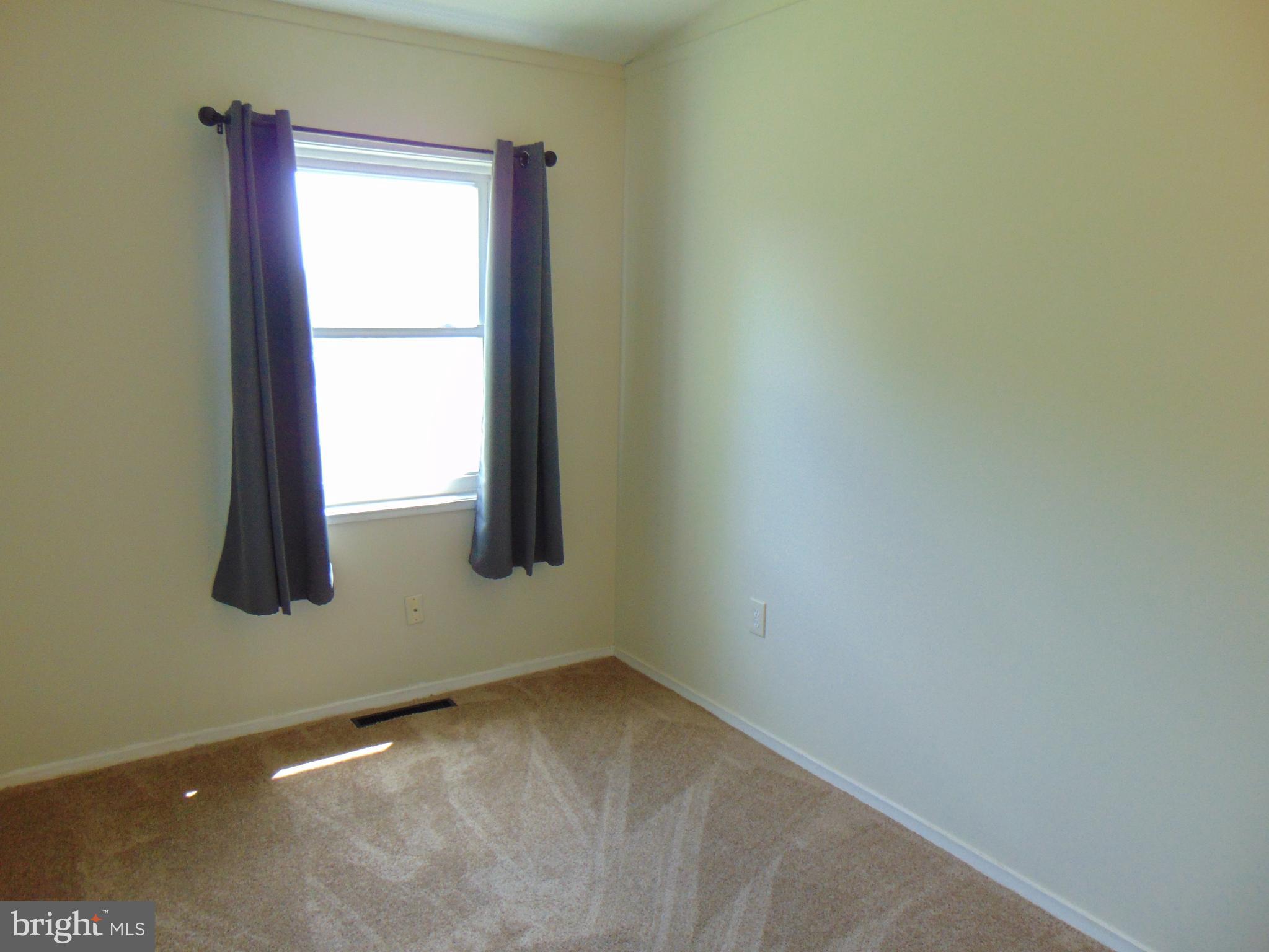 909 Oak Street Frederick, MD 21703 - Photo 8 of 34 Bedroom 2 w/ new carpet